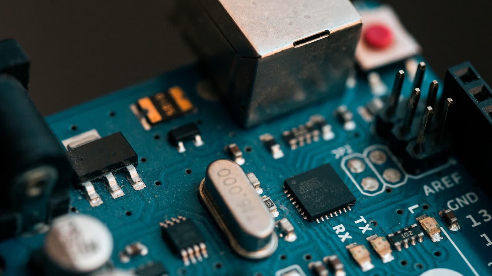 A macro photograph of high-tech circuit boards glowing with subtle blue light, representing enterprise-grade data security and AI processing hardware.